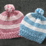 Two homemade knit hats for newborns