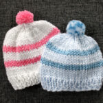 Two homemade knit hats for newborns