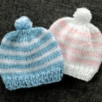 Two homemade knit hats for newborns