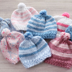 Knit newborn hats for donation to hospitals