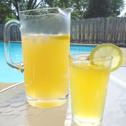 A pitcher and glass of agave lemonade