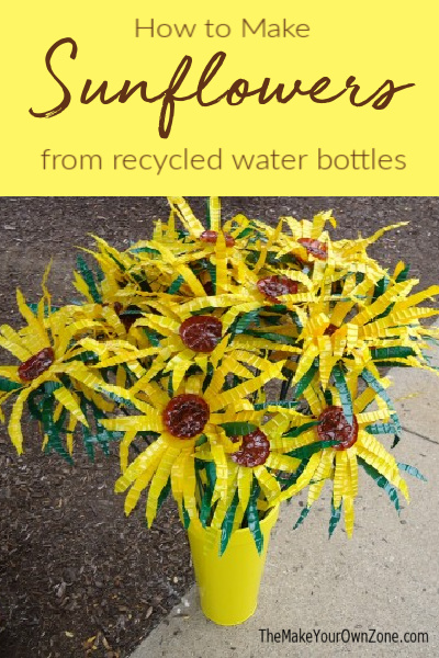 A vase of sunflowers made from recycled water bottles