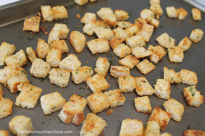 Homemade croutons on a baking sheet