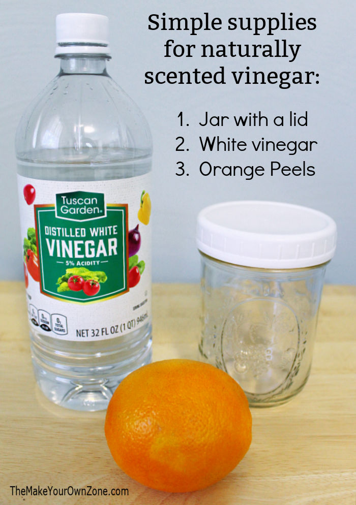 A pint jar, an orange, and vinegar to make your own scented vinegar