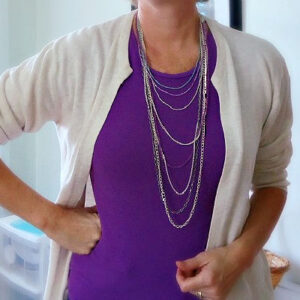 a cardigan made from a pullover sweater