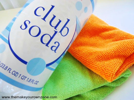 club soda being used as glass cleaner