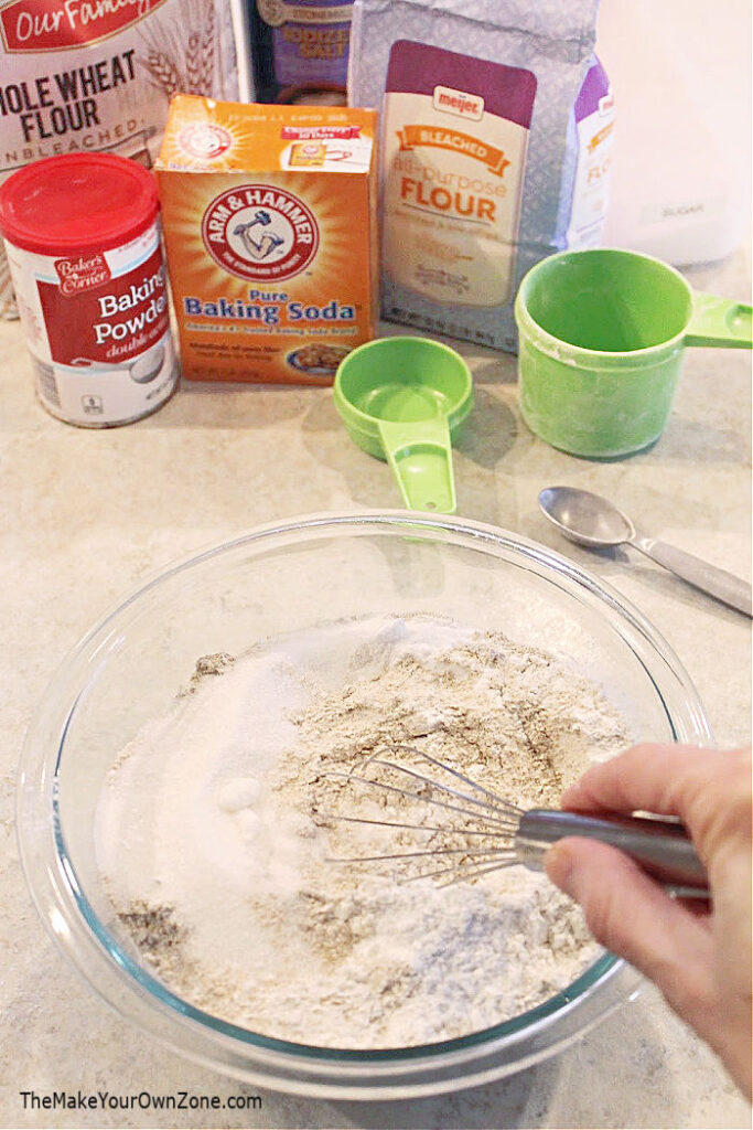 Stirring homemade pancake mix in a bowl