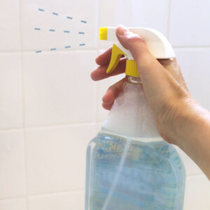 using a homemade daily shower spray