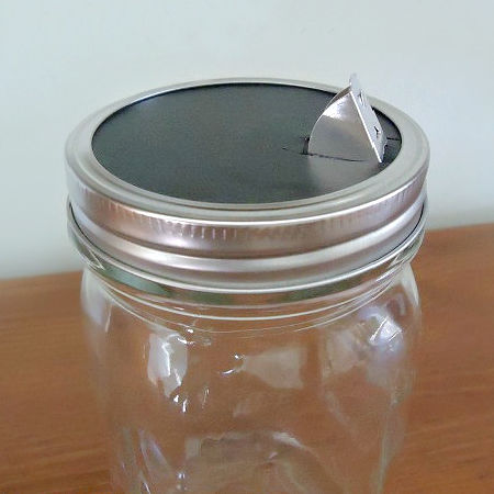 Use a salt container to make a canning jar lid