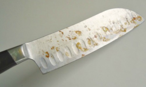 a knife with rust spots