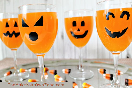 drinking glasses with Halloween jack-o-lantern faces