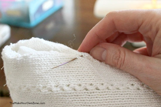 sewing a sweater pillow