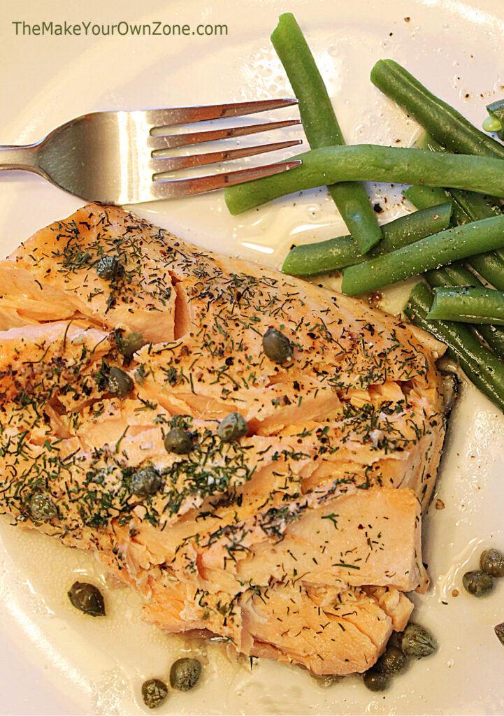 Salmon on a plate with green beans