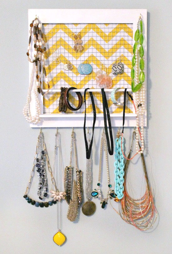 Adding jewelry to a homemade jewelry organizer