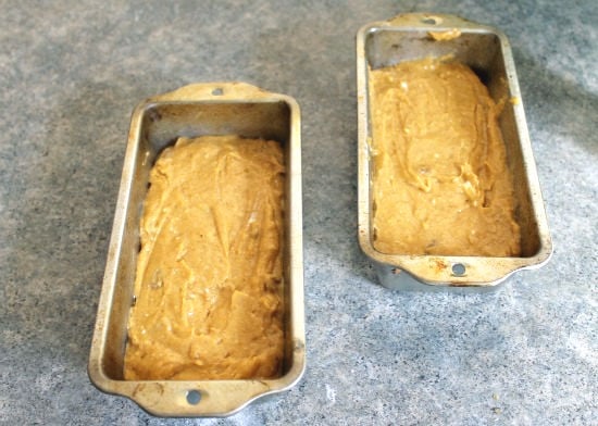 pumpkin nut bread batter in pans