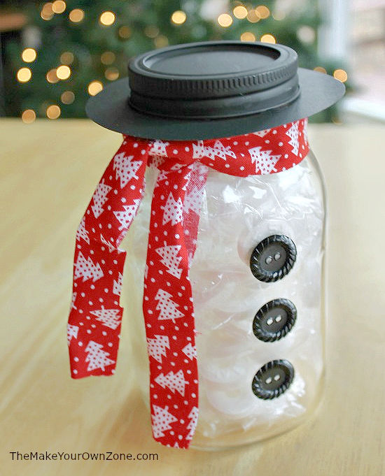 a snowman jar made from a canning jar