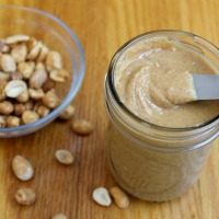 Homemade peanut butter is simple to make - you just need peanuts and a food processor! Includes step-by-step photos to show the stages the peanuts go through on their way to becoming peanut butter.