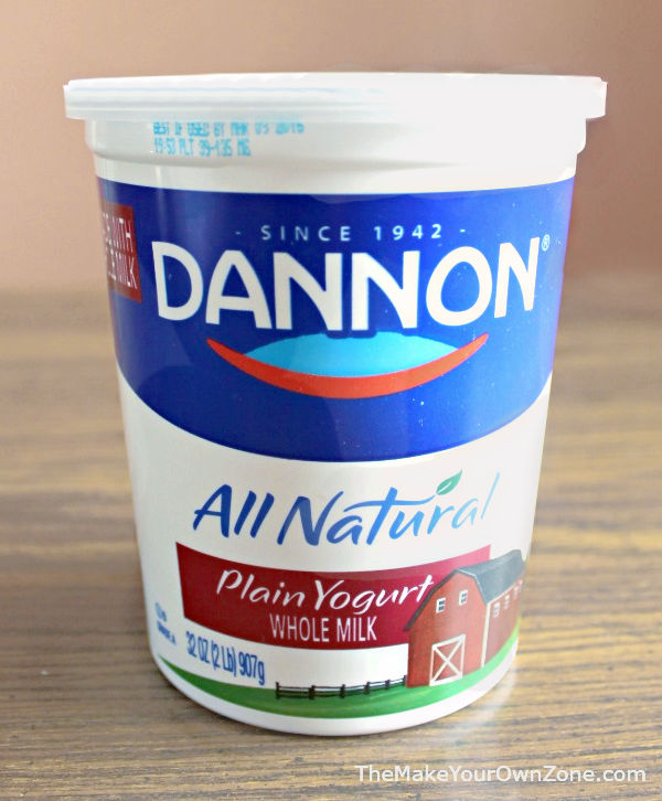 a container of plain yogurt to make labneh