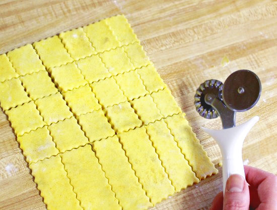 cutting homemade cheezits