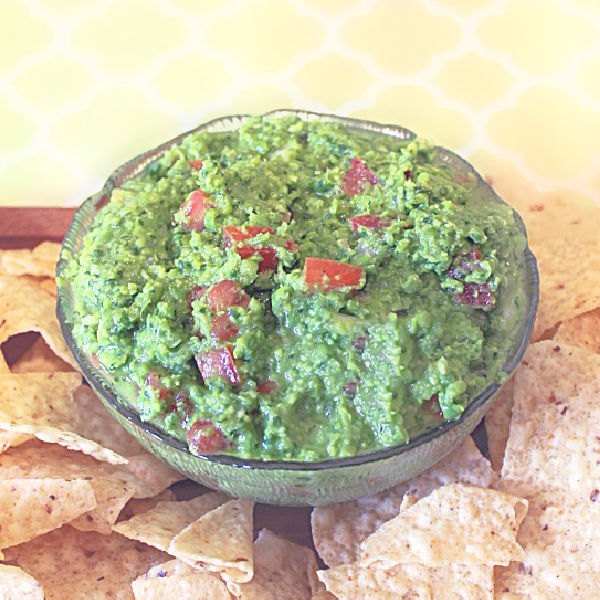 A bowl of homemade pea guacamole