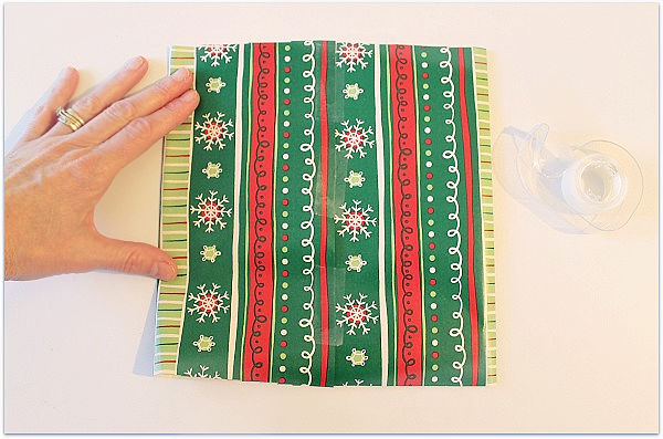 folding gift wrap to make a gift bag