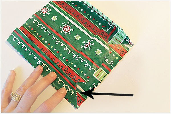 folding gift wrap to make a gift bag