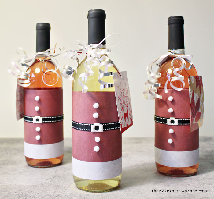 wine bottles with santa suits made from scrapbook paper