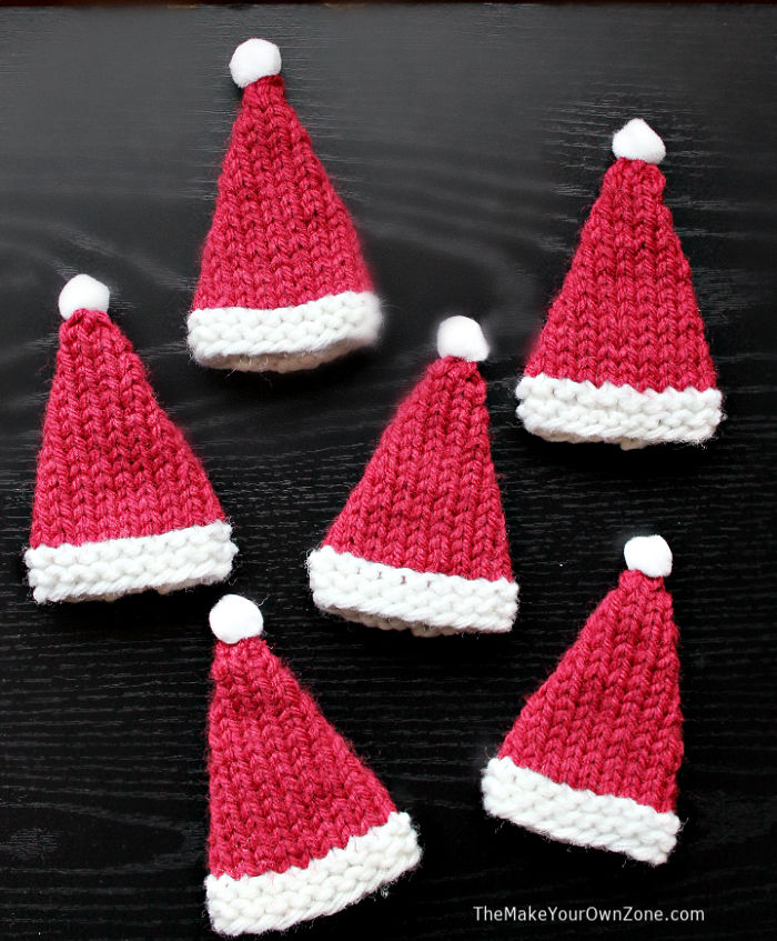 tiny knit santa hats to fit on the top of wine bottles