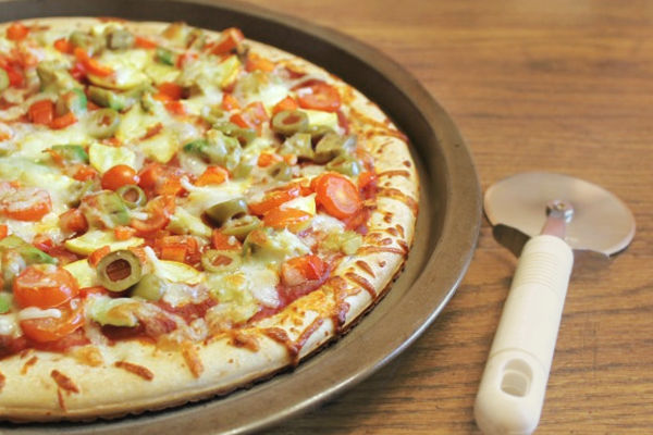 A pizza made with homemade pizza sauce