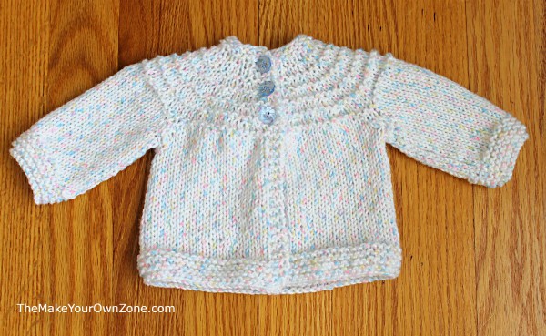 Free knitting pattern for a 5 hour baby sweater. Includes a simple adaptation to make it in a newborn size too!