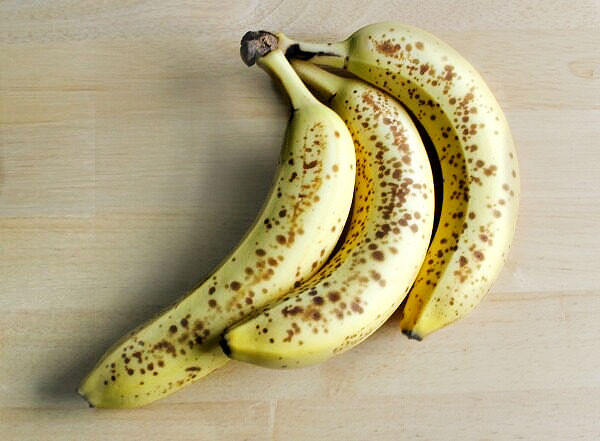 a bunch of ripe spotted bananas