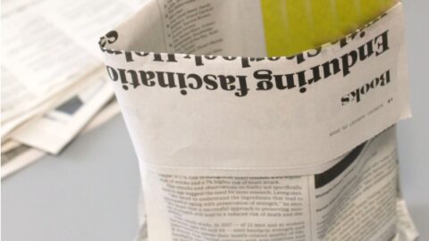a bag made with folded newspaper