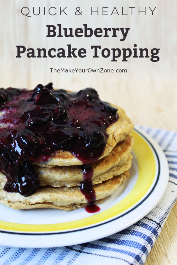 Stack of pancakes with homemade blueberry syrup topping