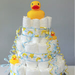 A rubber duck on a baby shower diaper cake