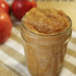 A jar of homemade applesauce made in a crockpot