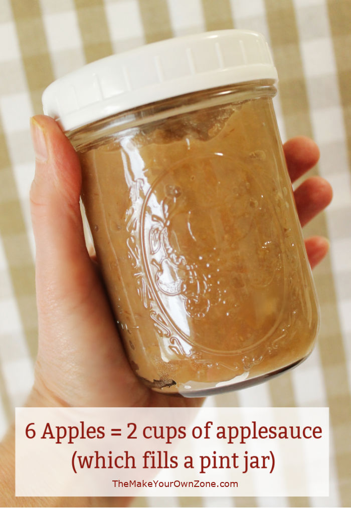 A pint jar filled with homemade applesauce