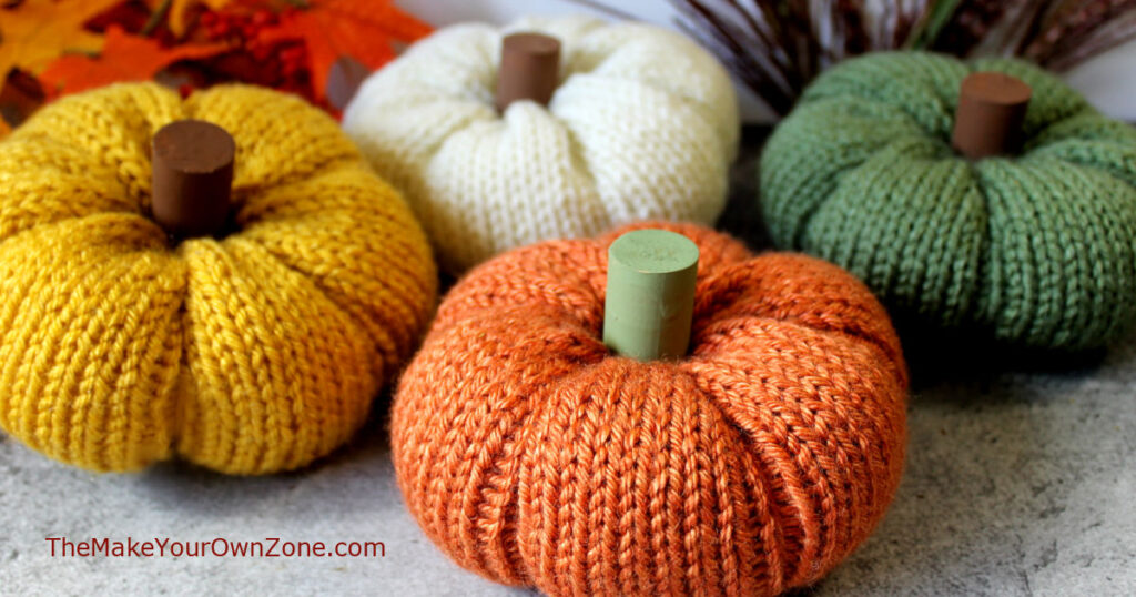 A group of homemade knit pumpkins.