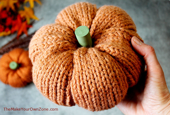 A homemade knit pumpkin made with bulky yarn
