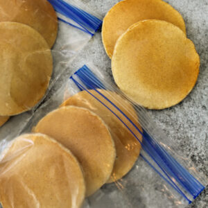 Packaging homemade pancakes in freezer bags
