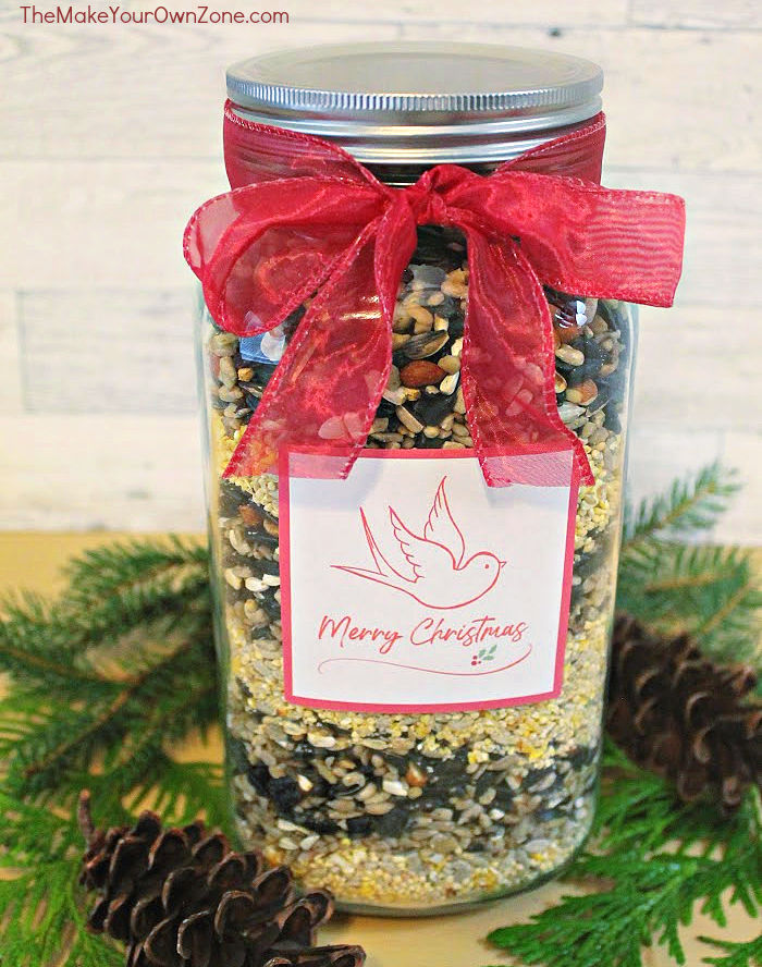 A layered jar of bird seed for a Christmas gift