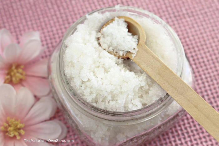 A jar of DIY sugar scrub made with coconut oil