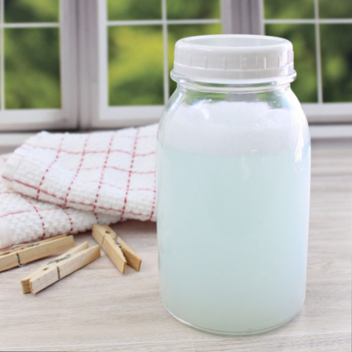 A jar of homemade liquid fabric softener made with hair conditioner